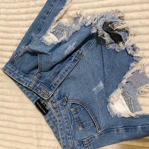 Pretty little thing distressed shorts